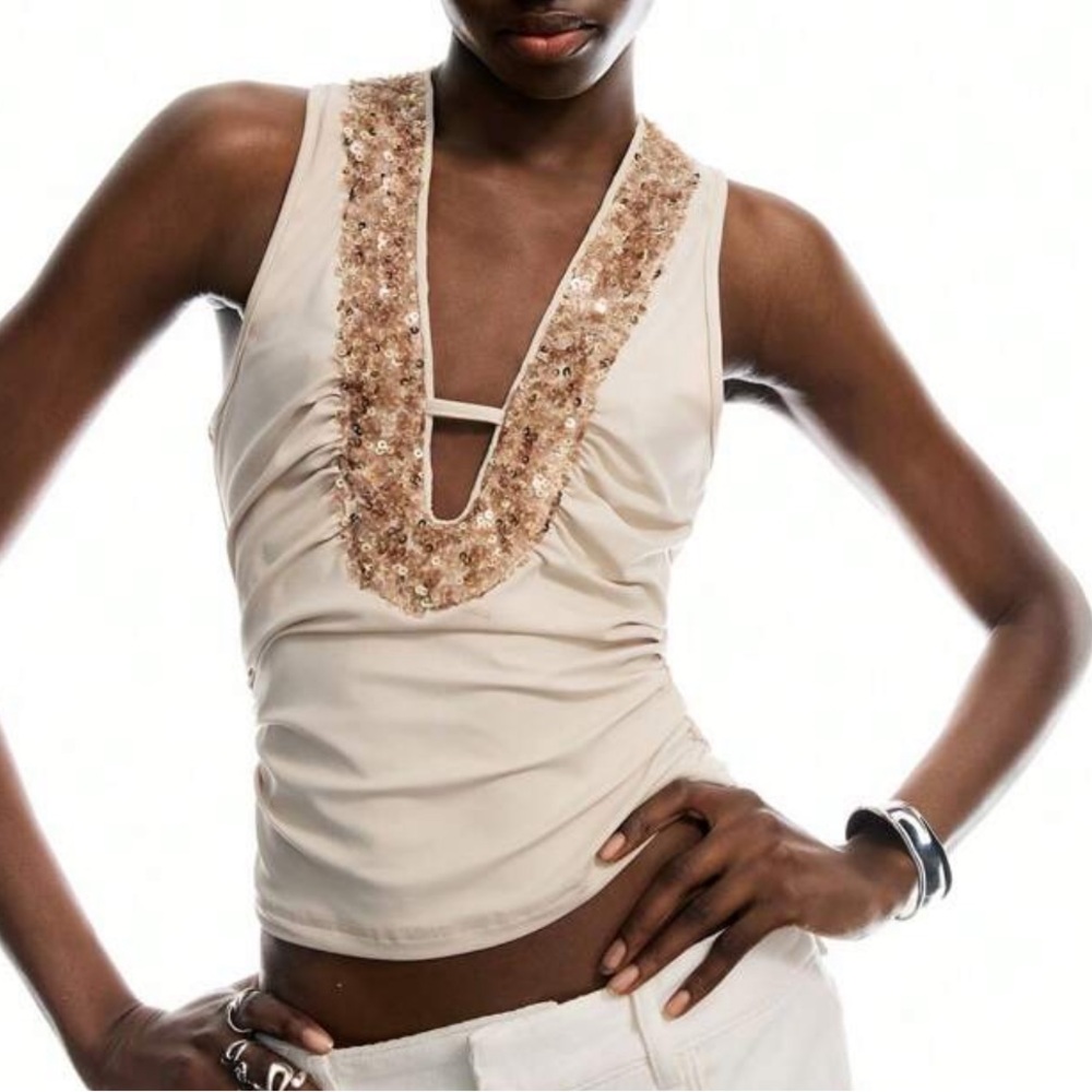 Cream stretchy ruched top with brown and beige sequin embellished details